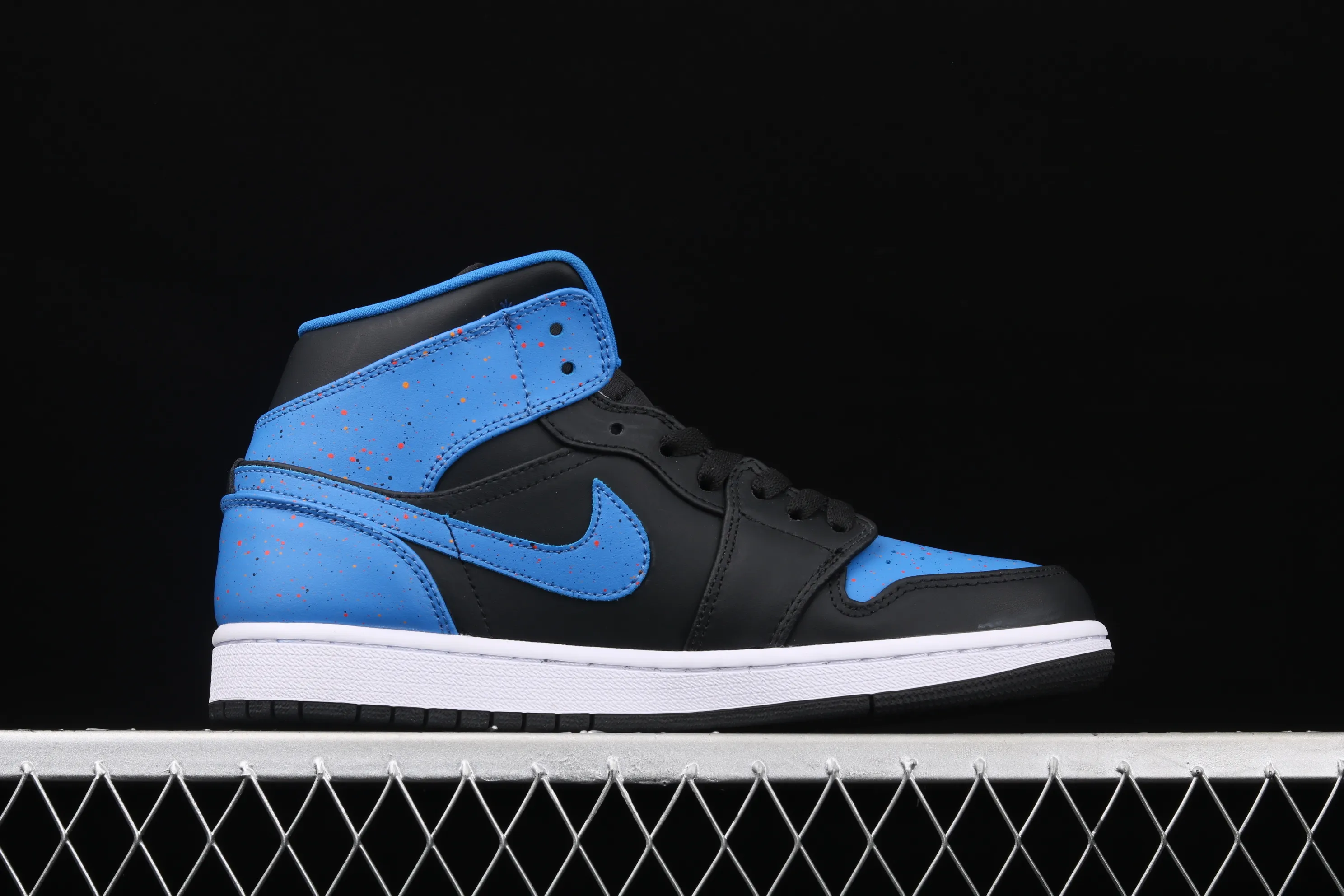 All categories Air Jordan Jordan series basketball shoes Air Jordan 1 Mid Air Jordan 1 Mid AJ1 Joe 1 inkjet black and blue Zhongbang basketball shoes 554724-048